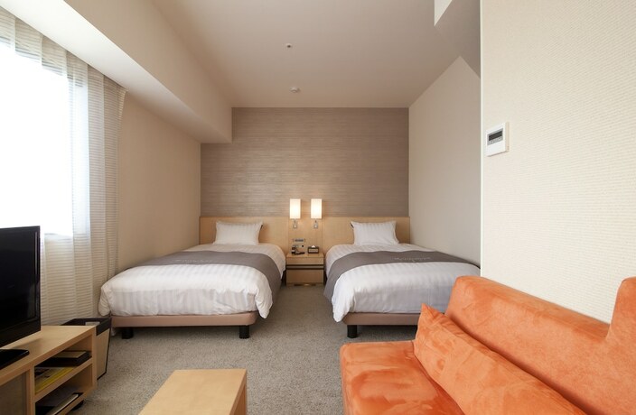 Imagen de la habitación del Hotel Cocochee Numazu. Foto 13