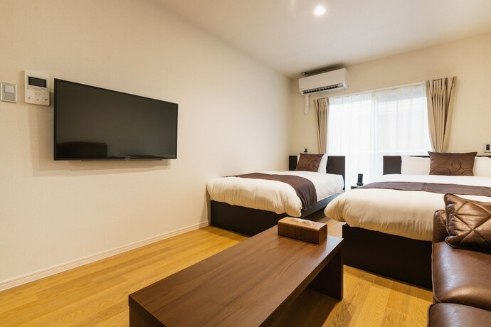 Imagen de la habitación del Hotel Cocolie Beppu. Foto 26