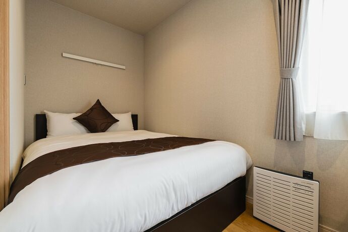 Imagen de la habitación del Hotel Cocolie Beppu. Foto 29