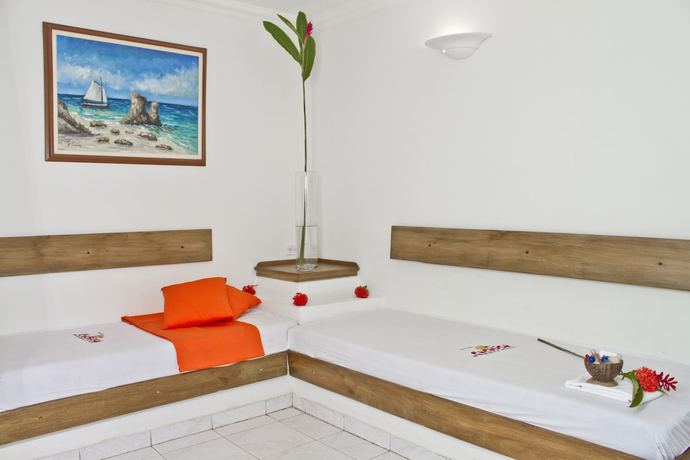 Imagen de la habitación del Hotel Cocoliso Island Resort. Foto 7