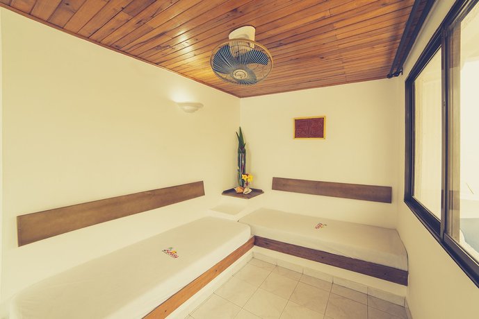 Imagen de la habitación del Hotel Cocoliso Island Resort. Foto 11