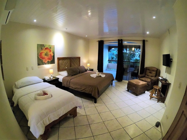 Imagen de la habitación del Hotel Cocomar Beachfront and Island Resort. Foto 5