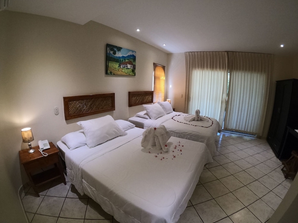 Imagen de la habitación del Hotel Cocomar Beachfront and Island Resort. Foto 9