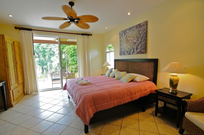 Imagen de la habitación del Hotel Cocomar Beachfront and Island Resort. Foto 18