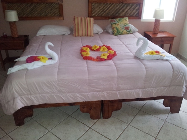 Imagen de la habitación del Hotel Cocomar Beachfront and Island Resort. Foto 19