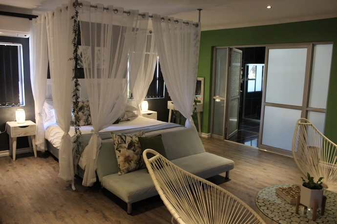 Imagen de la habitación del Hotel Cocomo Guesthouse, Spa and Conference Centre. Foto 7