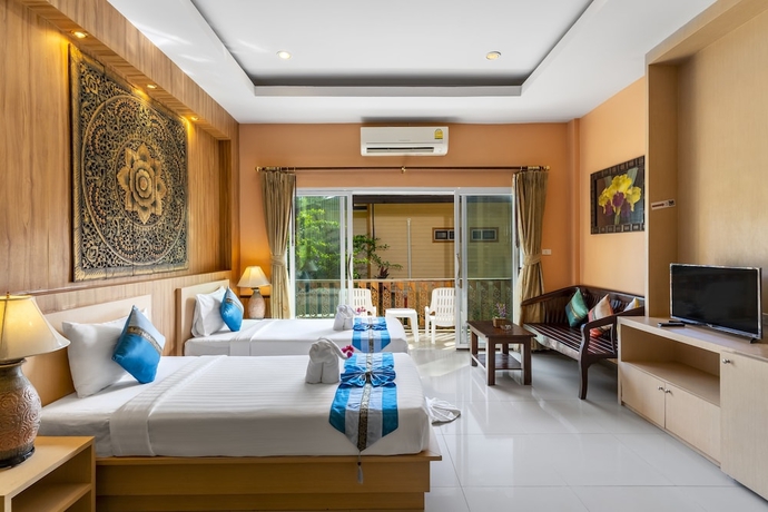 Imagen de la habitación del Hotel Coconut Beach Resort. Foto 11