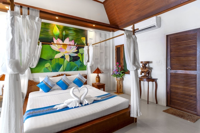 Imagen de la habitación del Hotel Coconut Beach Resort. Foto 17