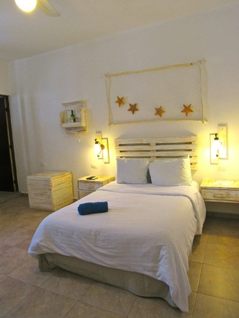 Imagen de la habitación del Hotel Coconut Boutique. Foto 6