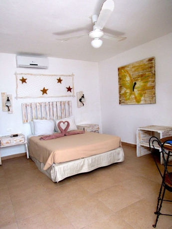 Imagen de la habitación del Hotel Coconut Boutique. Foto 7