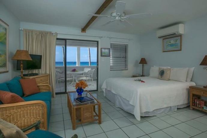 Imagen de la habitación del Hotel Coconut Coast Villas. Foto 18