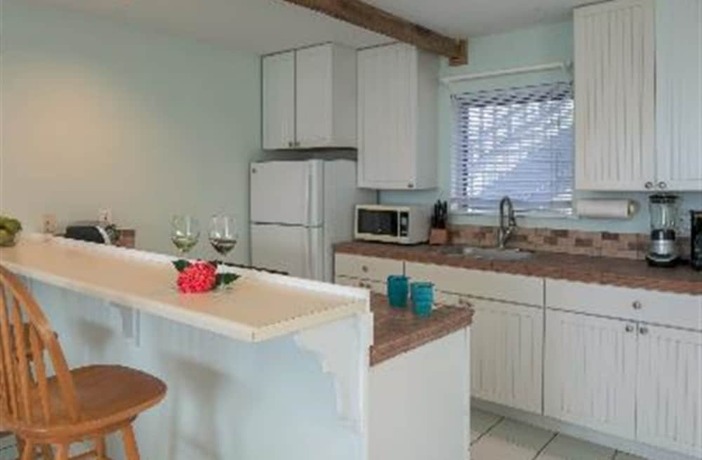 Imagen de la habitación del Hotel Coconut Coast Villas. Foto 19