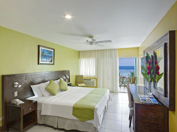 Imagen de la habitación del Hotel Coconut Court Beach. Foto 14