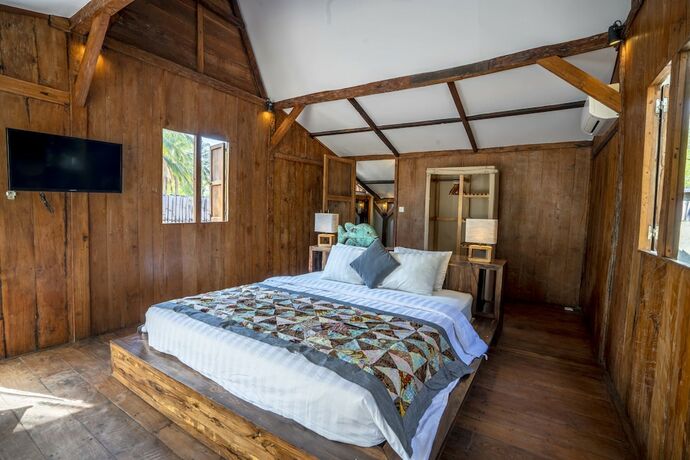 Imagen de la habitación del Hotel Coconut Garden Resort. Foto 18