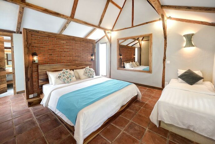 Imagen de la habitación del Hotel Coconut Garden Resort. Foto 21