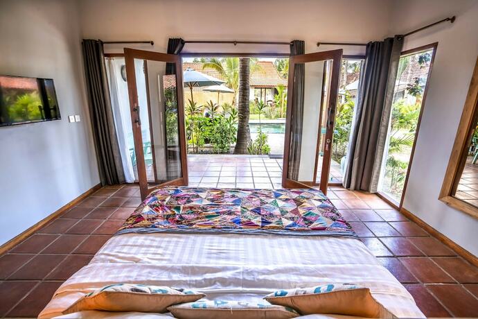 Imagen de la habitación del Hotel Coconut Garden Resort. Foto 22