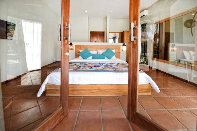 Imagen de la habitación del Hotel Coconut Garden Resort. Foto 26