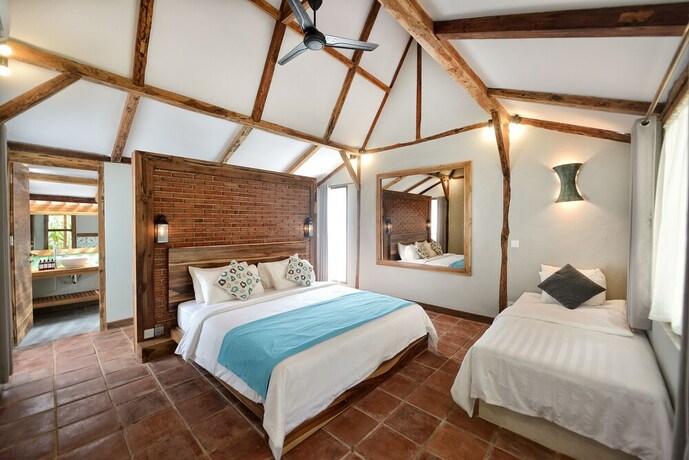 Imagen de la habitación del Hotel Coconut Garden Resort. Foto 29