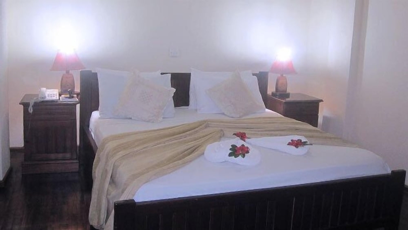 Imagen de la habitación del Hotel Coconut Grove Regency. Foto 2