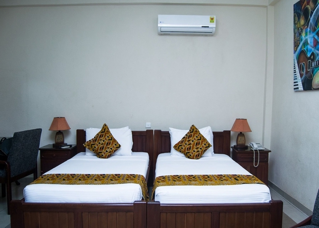 Imagen de la habitación del Hotel Coconut Grove Regency. Foto 4