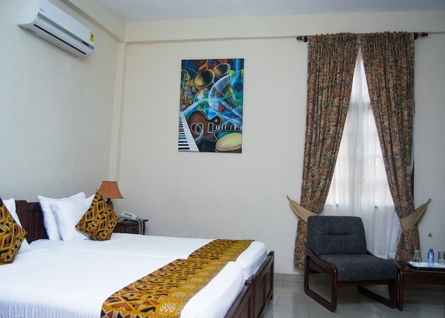 Imagen de la habitación del Hotel Coconut Grove Regency. Foto 5