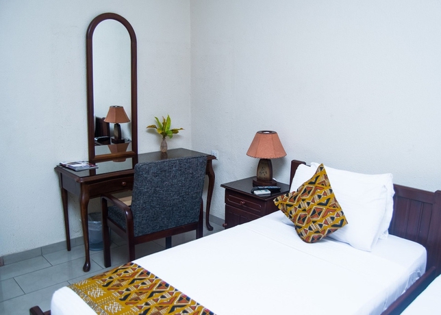 Imagen de la habitación del Hotel Coconut Grove Regency. Foto 9
