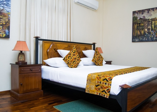Imagen de la habitación del Hotel Coconut Grove Regency. Foto 11