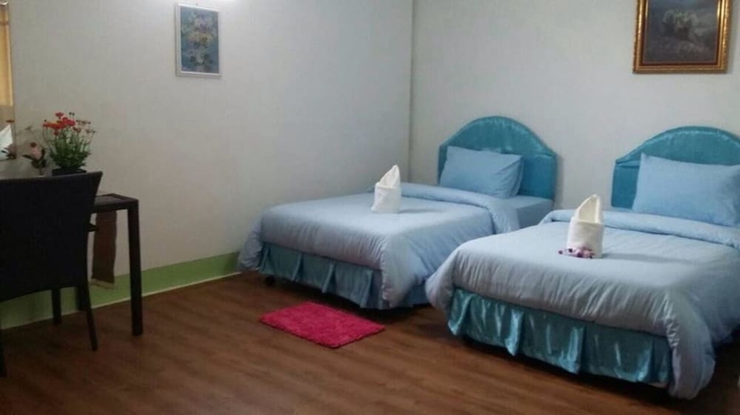 Imagen de la habitación del Hotel Coconut Home Resort. Foto 13