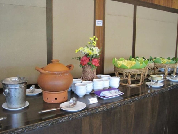 Imagen del bar/restaurante del Hotel Coconut Home Resort. Foto 5