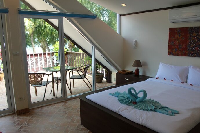 Imagen de la habitación del Hotel Coconut Laguna Villas. Foto 26