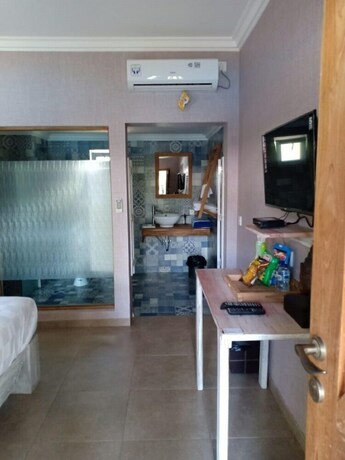 Imagen de la habitación del Hotel Coconut Lodge. Foto 12