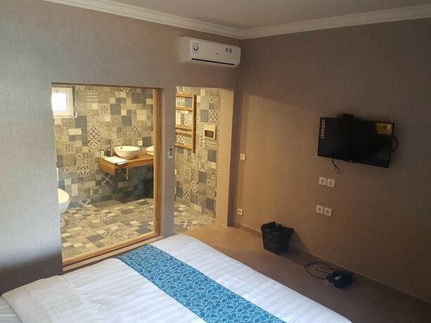Imagen de la habitación del Hotel Coconut Lodge. Foto 13