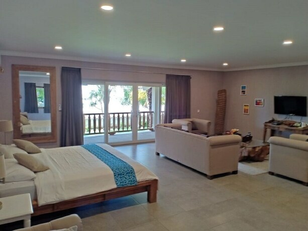Imagen de la habitación del Hotel Coconut Lodge. Foto 29