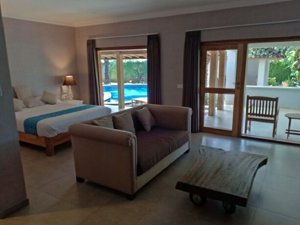 Imagen de la habitación del Hotel Coconut Lodge. Foto 30