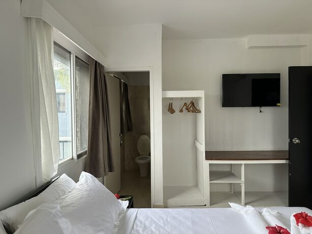 Imagen de la habitación del Hotel Coconut Palms Resort and Diamond Casino. Foto 20