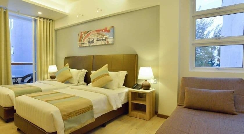 Imagen de la habitación del Hotel Coconut Tree Hulhuvilla Beach. Foto 10