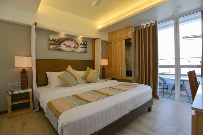 Imagen de la habitación del Hotel Coconut Tree Hulhuvilla Beach. Foto 13