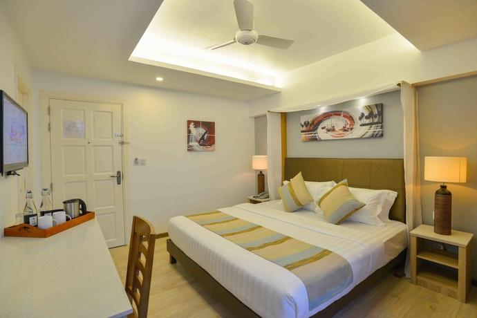 Imagen de la habitación del Hotel Coconut Tree Hulhuvilla Beach. Foto 15