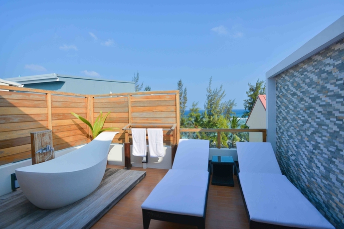 Imagen de la habitación del Hotel Coconut Tree Hulhuvilla Beach. Foto 16