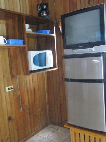 Imagen de la habitación del Hotel Coconut Tree West Bay. Foto 5