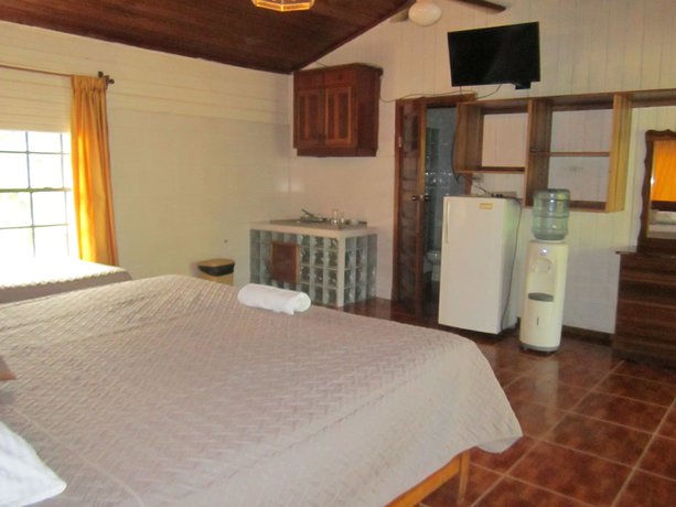 Imagen de la habitación del Hotel Coconut Tree West Bay. Foto 8