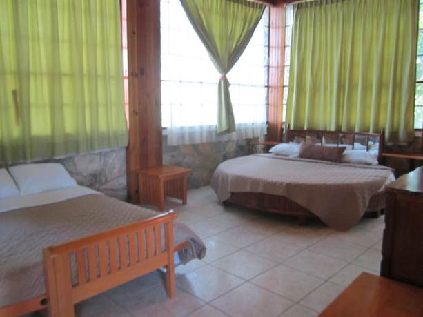 Imagen de la habitación del Hotel Coconut Tree West Bay. Foto 11