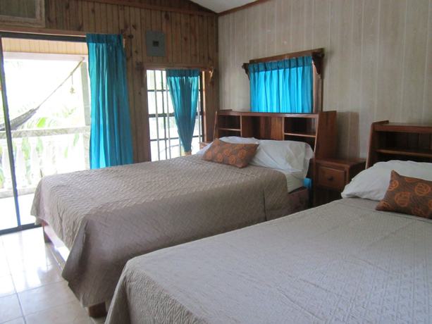 Imagen de la habitación del Hotel Coconut Tree West Bay. Foto 16