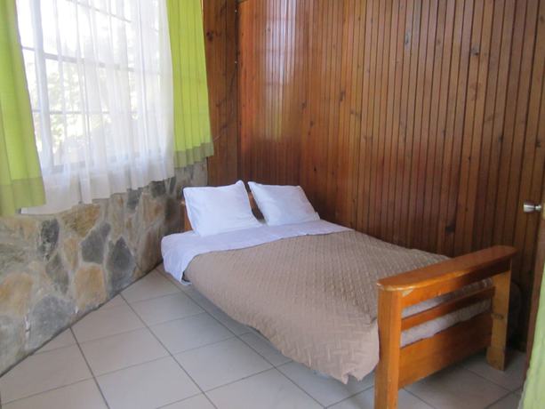 Imagen de la habitación del Hotel Coconut Tree West Bay. Foto 19