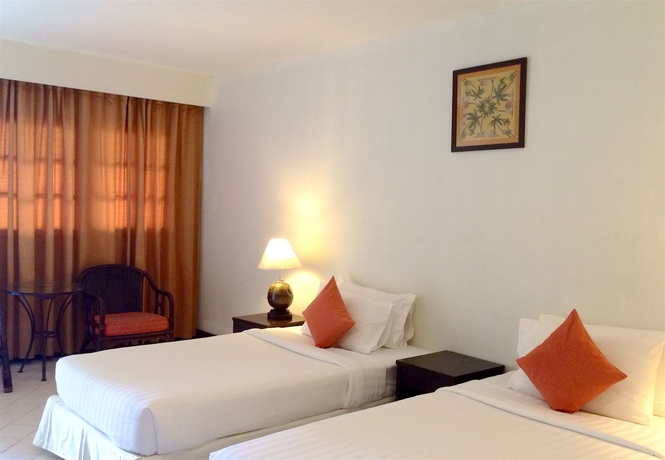 Imagen de la habitación del Hotel Coconut Village Resort. Foto 2