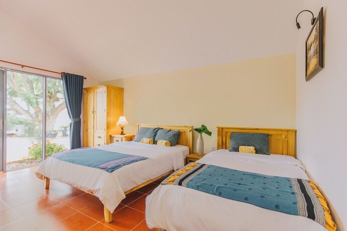 Imagen de la habitación del Hotel Cocoon Bungalow. Foto 18