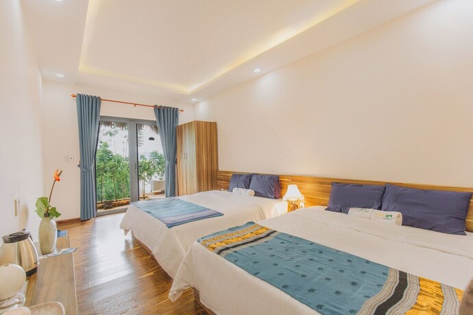 Imagen de la habitación del Hotel Cocoon Bungalow. Foto 23