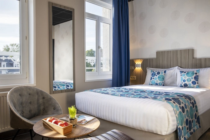 Imagen de la habitación del Hotel Cocoon Inn. Foto 7