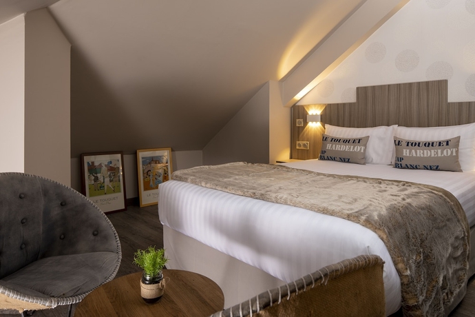 Imagen de la habitación del Hotel Cocoon Inn. Foto 11