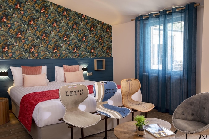 Imagen de la habitación del Hotel Cocoon Inn. Foto 14